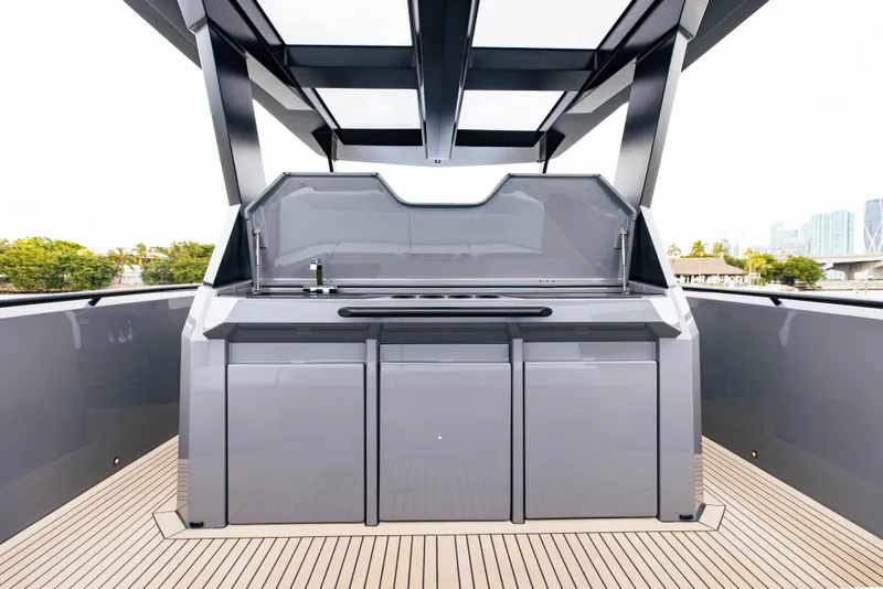Slide: The Image of 2022 Vanquish Yachts VQ40 luxury yacht deck with modern outdoor kitchen. - 13