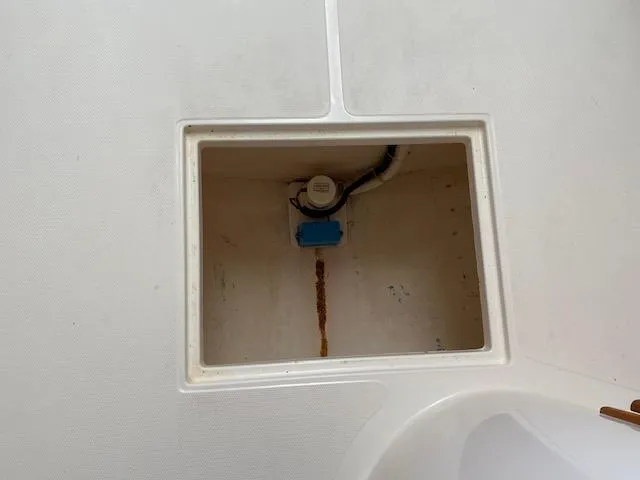 Slide: The Image of Cabo 35 Express 2000 cabin interior with bed and storage compartments. - 19