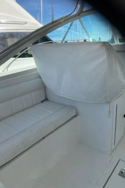 Slide: The Image of Control panel of a 2000 Cabo 35 Express boat with navigation screens and gauges. - 24