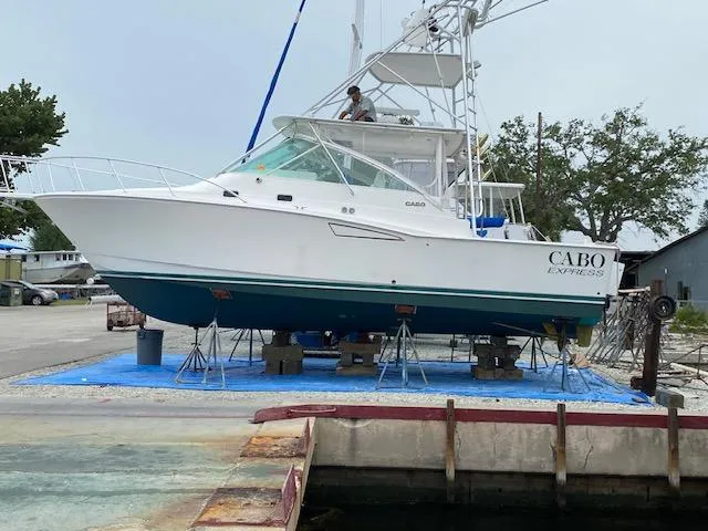 Slide: The Image of 2000 Cabo 35 Express boat deck and windshield. - 41