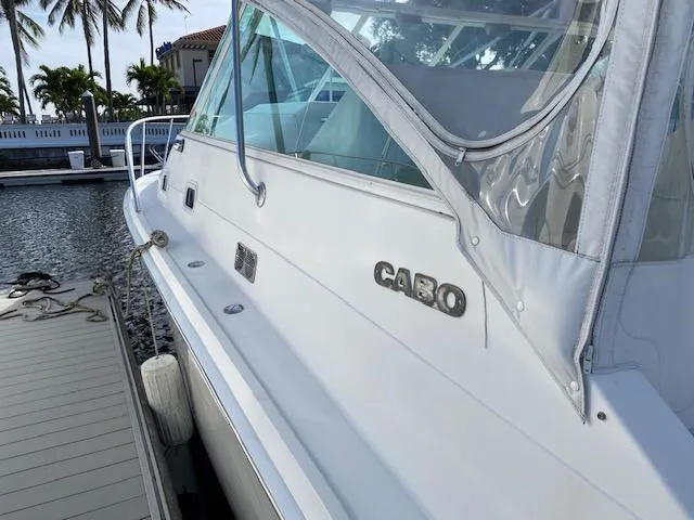 Slide: The Image of 2000 Cabo 35 Express boat docked in Sarasota, Florida. - 6