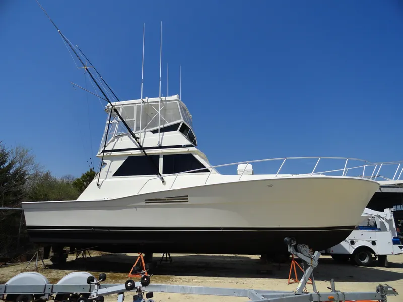 Slide: The Image of 1989 Viking 41 Sportfish Convertible on stands, side view. - 1