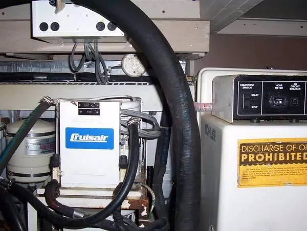 Slide: The Image of Engine room of 1989 Viking 41 Sportfish Convertible with Cruisair system. - 16