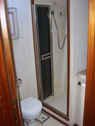 Slide: The Image of Bathroom of the 1989 Viking 41 Sportfish Convertible yacht. - 17