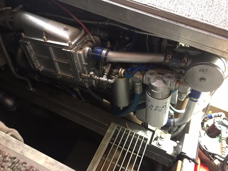 Slide: The Image of Engine room of a 1989 Viking 41 Sportfish Convertible boat. - 24