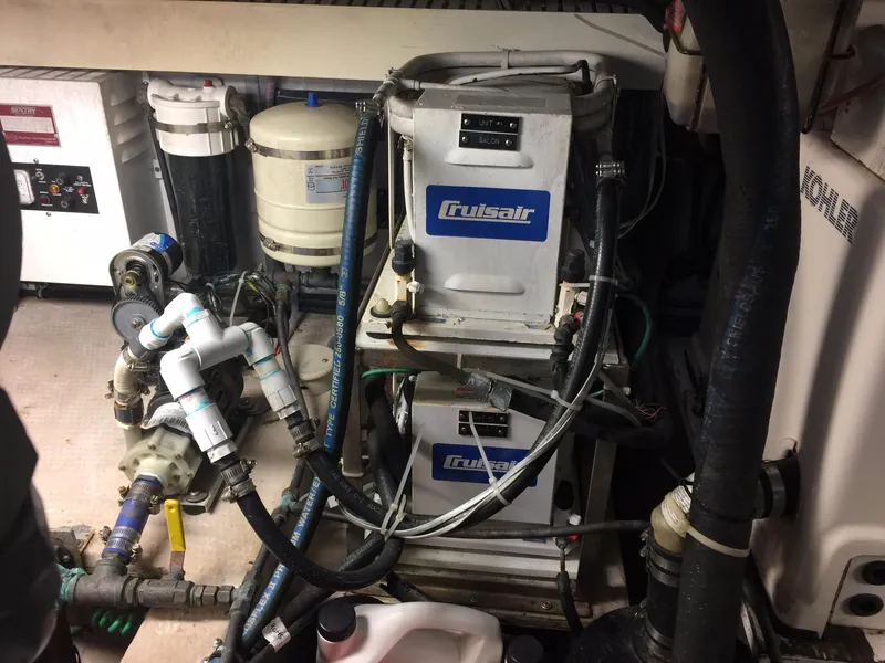 Slide: The Image of Engine room of 1989 Viking 41 Sportfish Convertible with Cruisair air conditioning. - 29