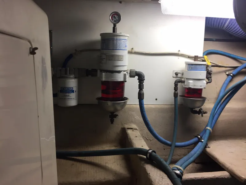 Slide: The Image of Engine room of a 1989 Viking 41 Sportfish Convertible boat. - 32