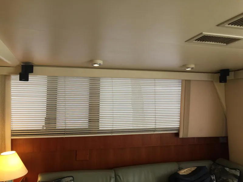 Slide: The Image of Interior of 1989 Viking 41 Sportfish Convertible with blinds. - 34