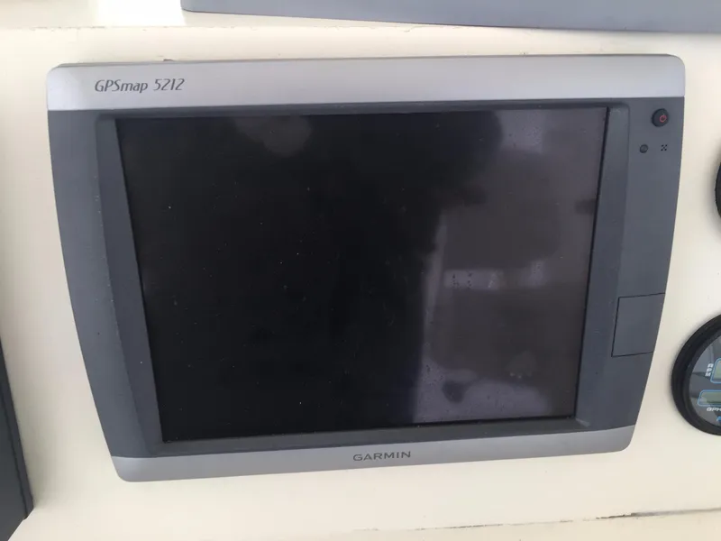 Slide: The Image of Garmin GPSmap 5212 on Viking 41 Sportfish Convertible 1989. - 36