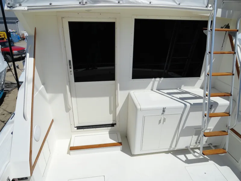 Slide: The Image of 1989 Viking 41 Sportfish Convertible, rear view with stairs and door. - 4