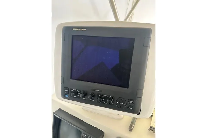 Slide: The Image of Furuno marine radar display on 1989 Viking 41 Sportfish Convertible boat. - 49