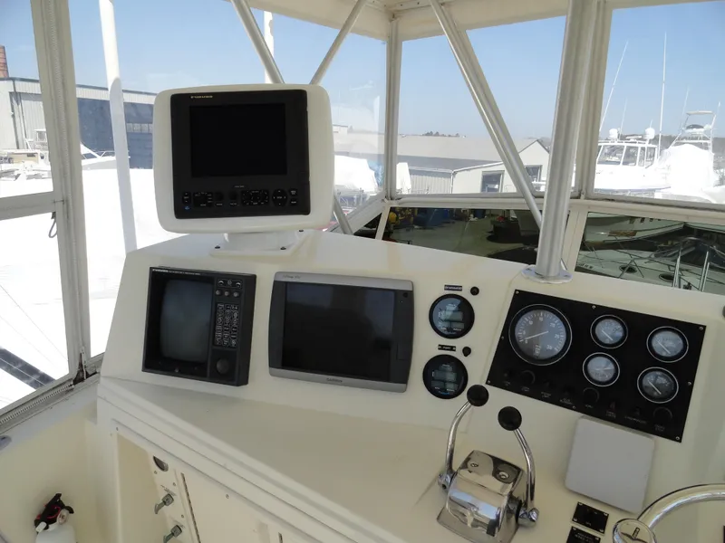 Slide: The Image of 1989 Viking 41 Sportfish Convertible helm with navigation instruments. - 5
