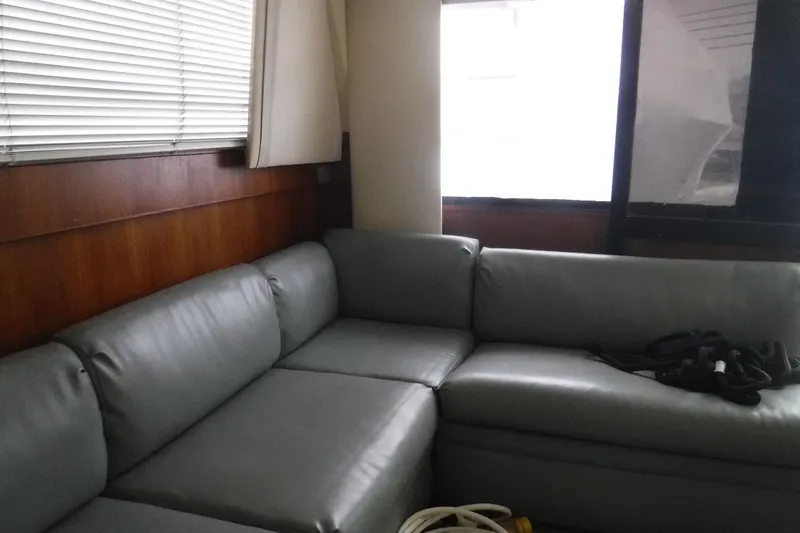 Slide: The Image of Interior of 1989 Viking 41 Sportfish Convertible with gray leather seating. - 62