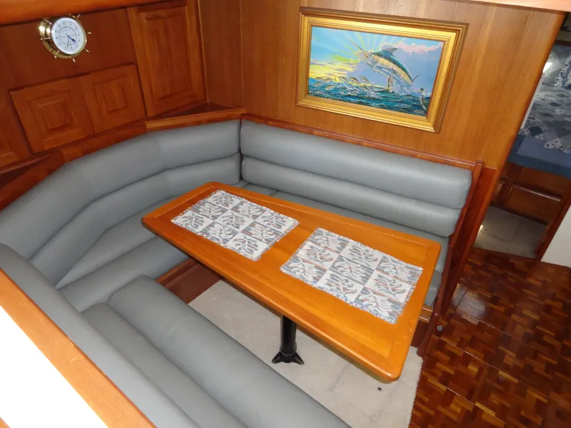 Slide: The Image of 1989 Viking 41 Sportfish Convertible interior with cozy seating area. - 9