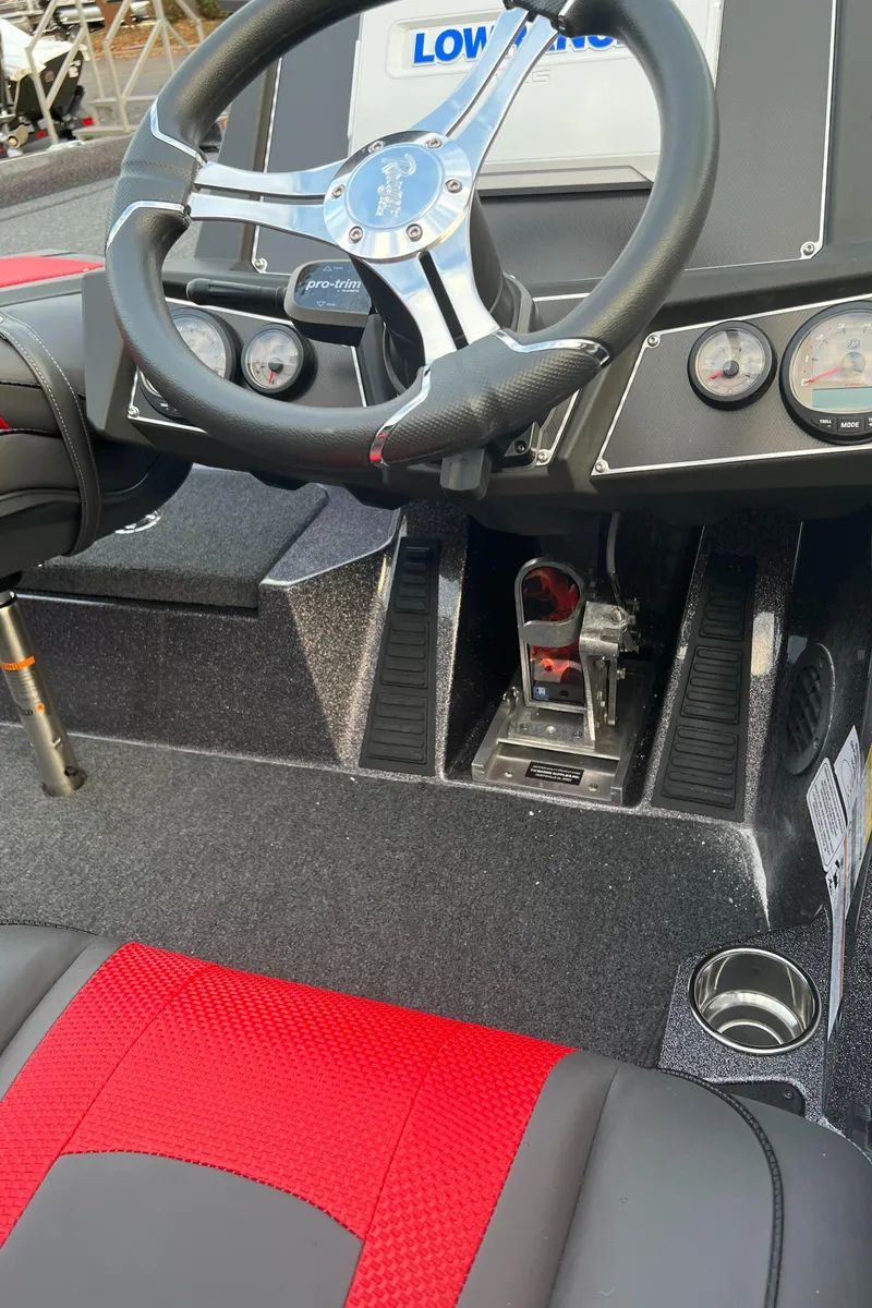 Slide: The Image of 2024 Ranger Z519 Ranger Cup Equipped boat cockpit with steering wheel and control panel. - 4