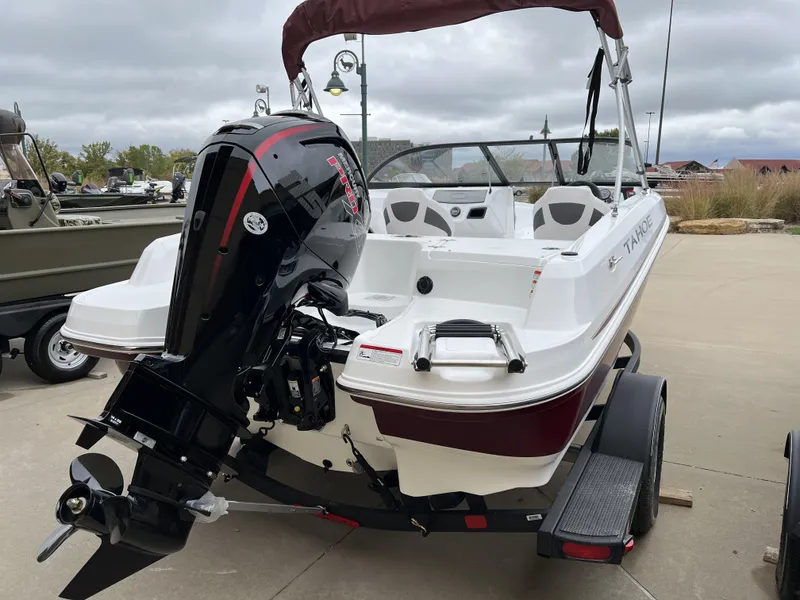 Slide: The Image of 2024 Tahoe 185 S boat with outboard motor on trailer. - 4