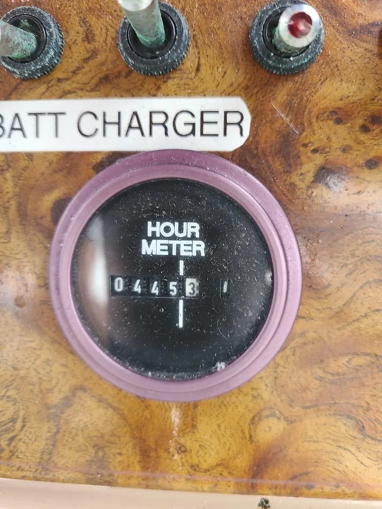 Slide: The Image of Hour meter reading 4453 on 2003 Bayliner 285 Ciera boat dashboard. - 7