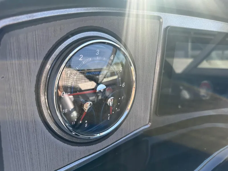 Slide: The Image of Close-up of 2024 Sanger V215 SX dashboard gauge in sunlight. - 14
