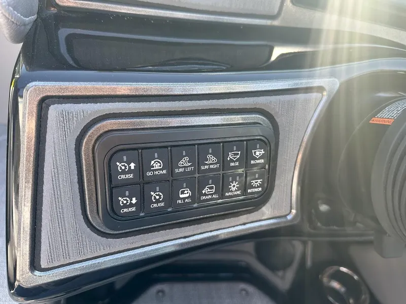 Slide: The Image of 2024 Sanger V215 SX control panel with various function buttons. - 16