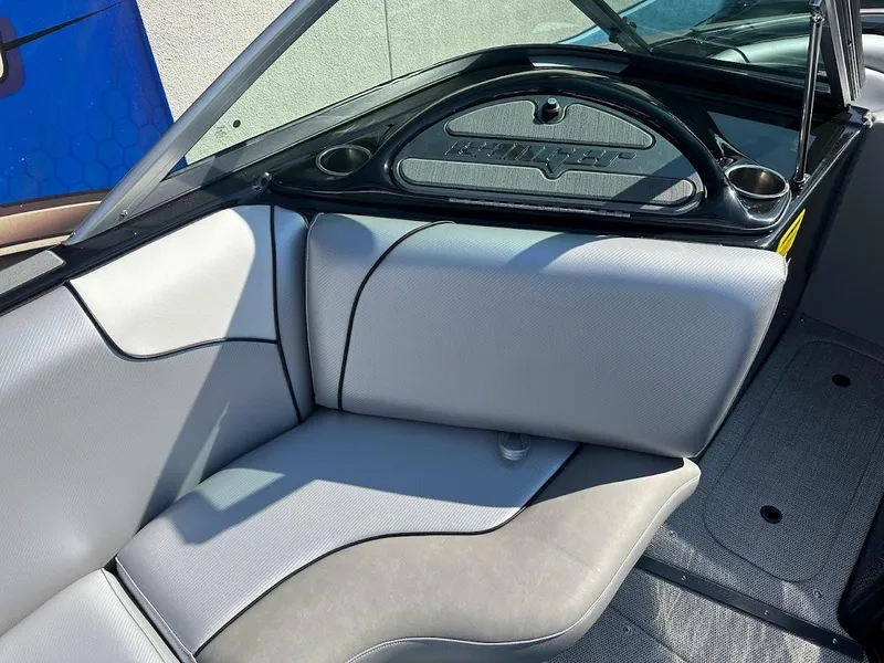 Slide: The Image of 2024 Sanger V215 SX boat interior with gray and white seating. - 17