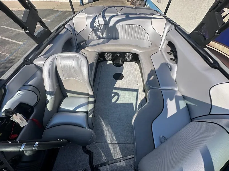 Slide: The Image of 2024 Sanger V215 SX boat interior with gray seating and modern design. - 20