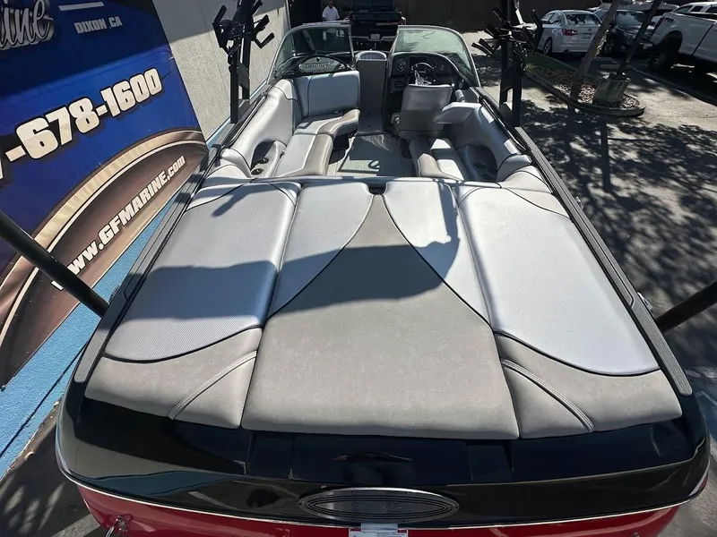 Slide: The Image of 2024 Sanger V215 SX boat interior with gray seating and black accents. - 8