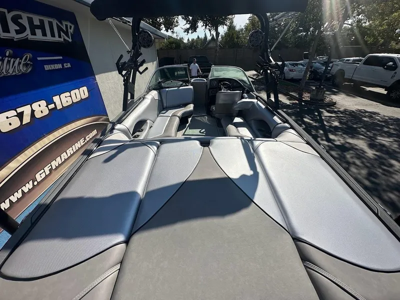 Slide: The Image of 2024 Sanger V215 SX boat interior with gray seating and black accents. - 9