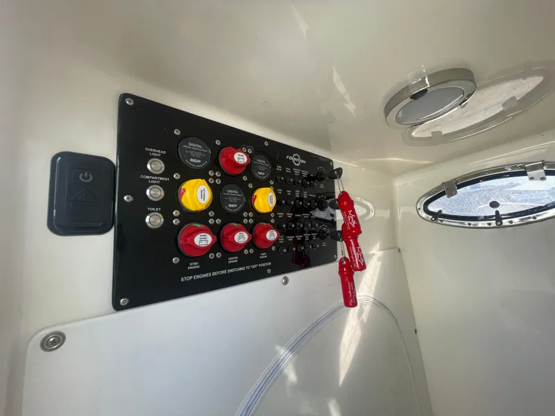 Slide: The Image of Control panel of a 2020 Fountain 38 Center Console boat. - 14