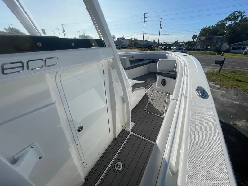Slide: The Image of 2020 Fountain 38 Center Console boat interior with white and black detailing. - 15