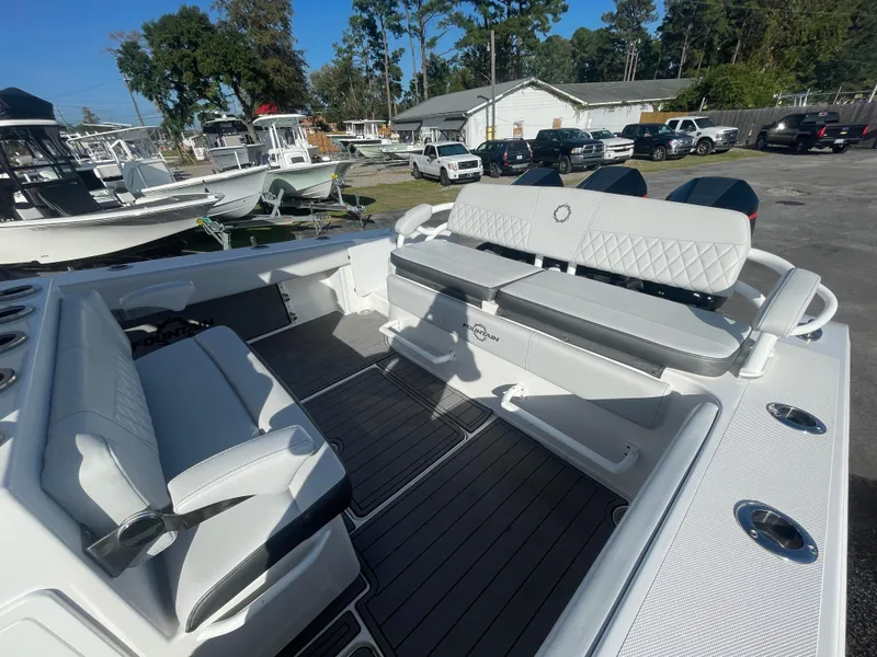 Slide: The Image of 2020 Fountain 38 Center Console boat interior with seating and storage compartments. - 22