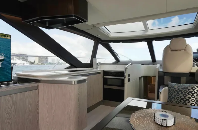 Slide: The Image of Luxurious interior of 2021 Azimut S6 Sports Fly yacht with modern design and panoramic windows. - 14