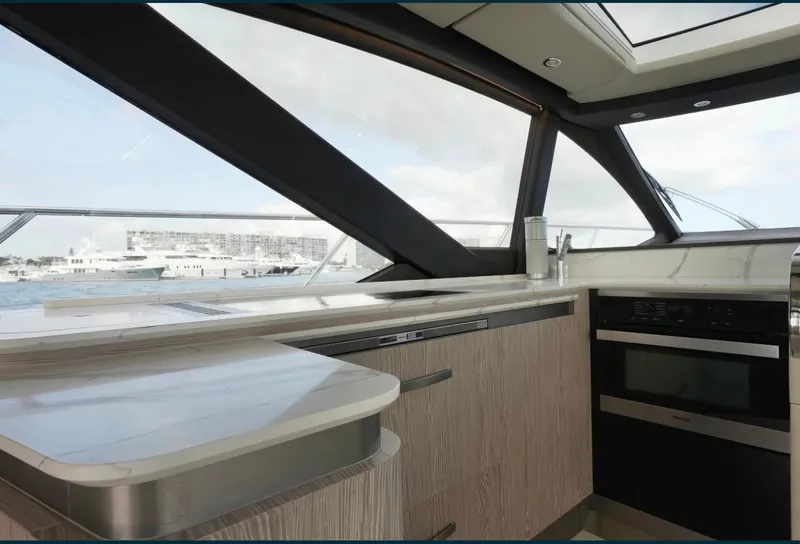 Slide: The Image of Luxurious interior of 2021 Azimut S6 Sports Fly yacht with modern kitchen design. - 15