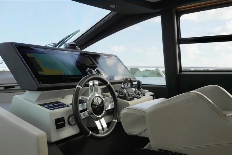 Slide: The Image of Cockpit of 2021 Azimut S6 Sports Fly yacht with modern steering and navigation system. - 17
