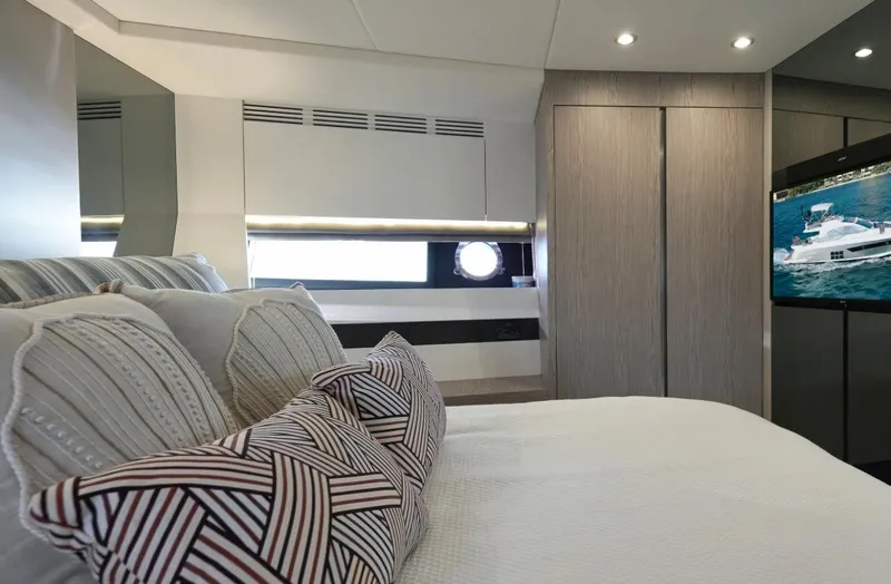 Slide: The Image of Luxurious bedroom interior of 2021 Azimut S6 Sports Fly yacht with modern decor. - 24