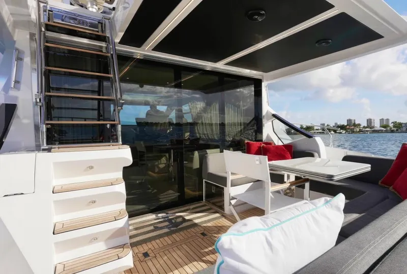 Slide: The Image of Luxurious 2021 Azimut S6 Sports Fly yacht deck with seating and ocean view. - 6