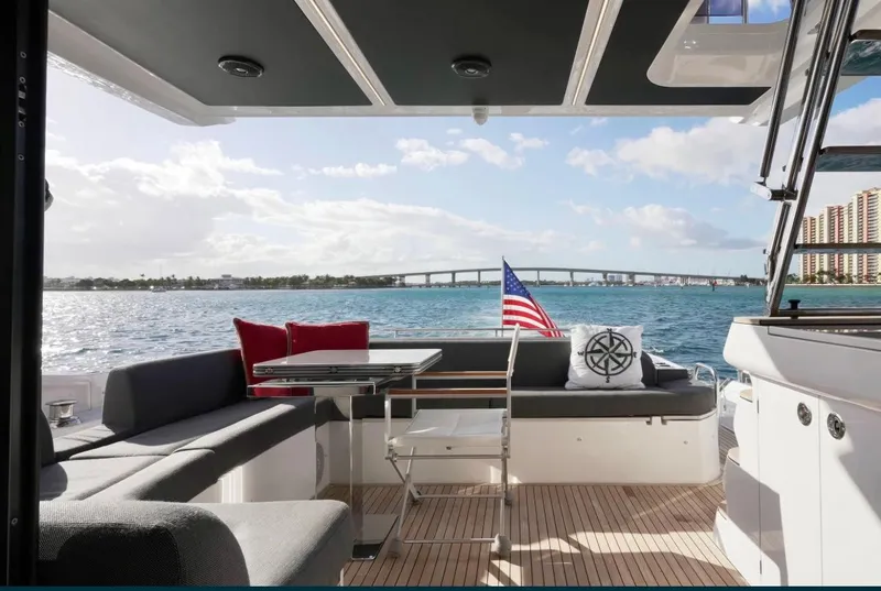 Slide: The Image of Luxurious 2021 Azimut S6 Sports Fly yacht deck with seating, table, and ocean view. - 7