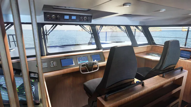 Slide: The Image of Interior cockpit of Archipelago 47 yacht, 2025 model, with modern navigation equipment. - 9