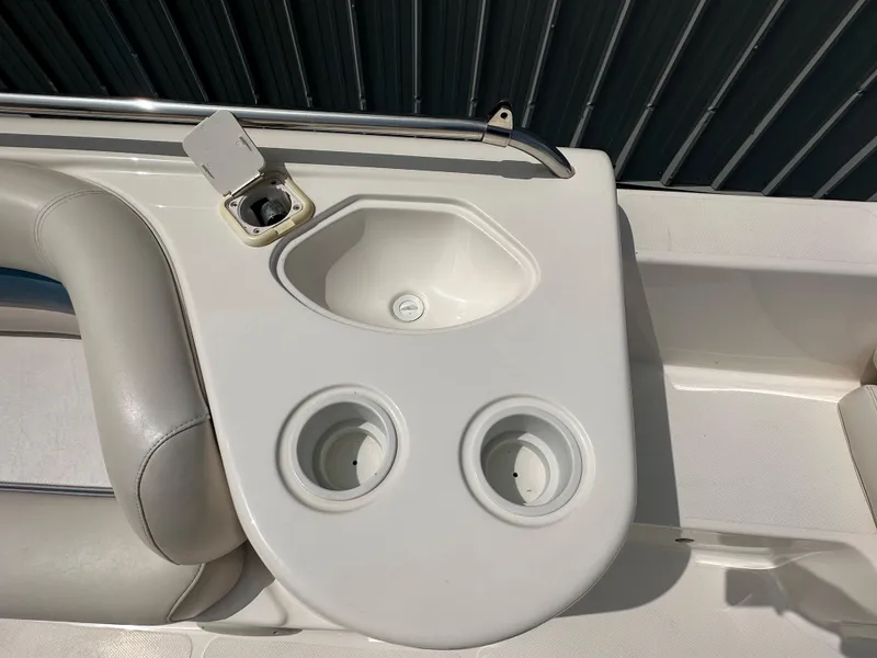 Slide: The Image of 2007 Hurricane 201 FUNDECK c boat with cup holders and sink. - 14