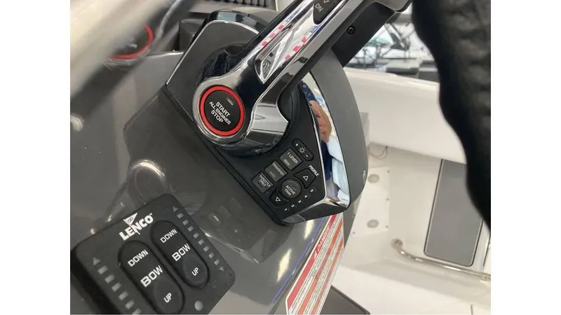 Slide: The Image of Close-up of the control panel on a 2024 Blackfin 272 CC boat. - 12