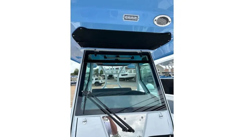 Slide: The Image of 2024 Blackfin 272 CC boat windshield and console. - 6