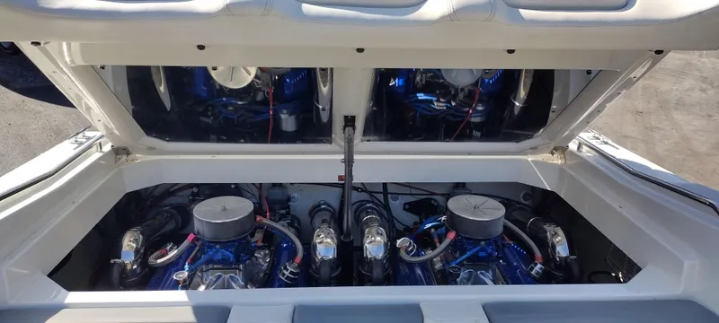Slide: The Image of 1991 Formula 272 SR1 boat engine compartment with dual engines. - 23