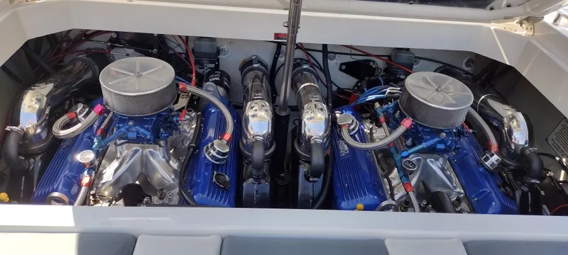 Slide: The Image of 1991 Formula 272 SR1 boat engine compartment with dual engines. - 28