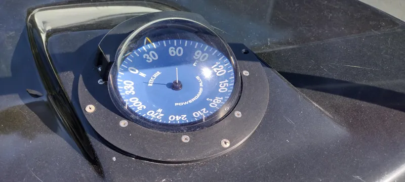 Slide: The Image of 1991 Formula 272 SR1 boat compass on dashboard. - 29
