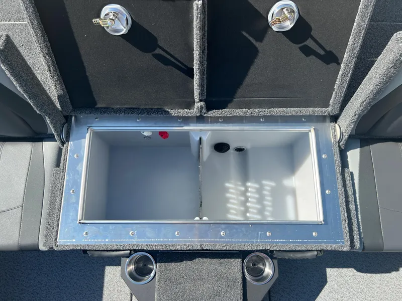 Slide: The Image of 2024 Lund 1875 Pro-V Bass XS livewell compartment with open lid. - 19