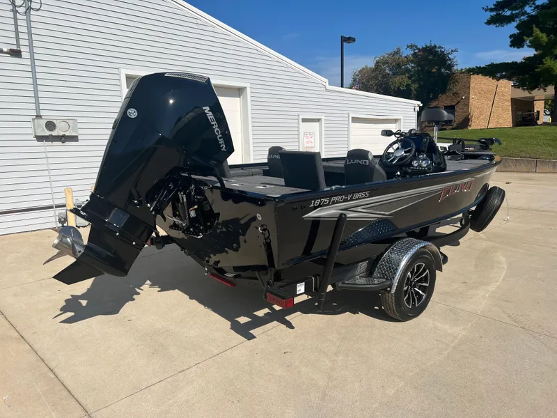 Slide: The Image of 2024 Lund 1875 Pro-V Bass XS fishing boat with Mercury outboard motor. - 6
