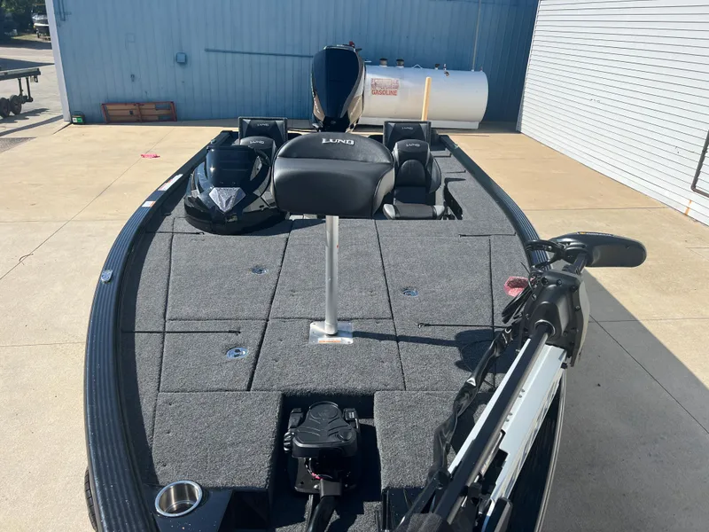 Slide: The Image of 2024 Lund 1875 Pro-V Bass XS fishing boat with spacious deck and seating. - 7