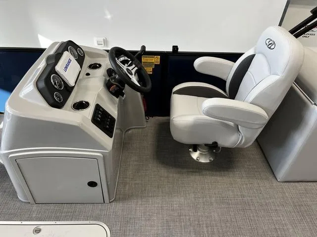 Slide: The Image of 2024 Bentley Pontoons Fish 223 Center Walk-Thru 3/4 Tube helm station with captain's chair. - 12