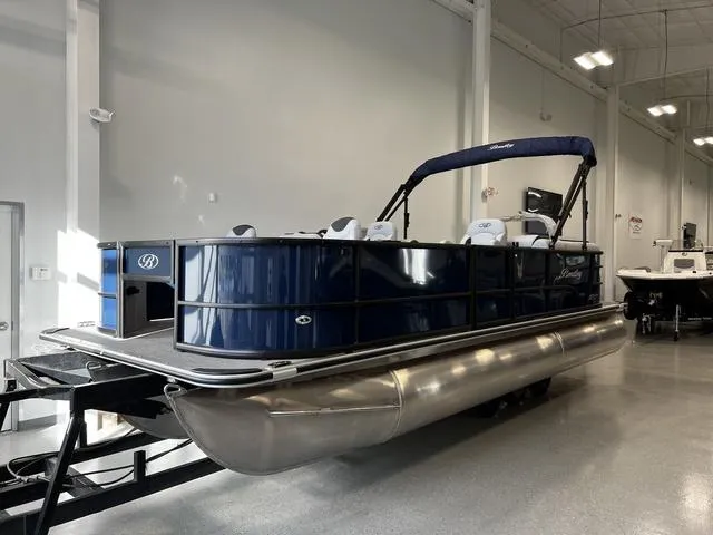 Slide: The Image of 2024 Bentley Pontoons Fish 223 Center Walk-Thru 3/4 Tube in showroom. - 3