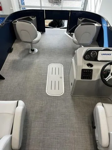 Slide: The Image of 2024 Bentley Pontoons Fish 223 Center Walk-Thru 3/4 Tube interior with seating and control console. - 7