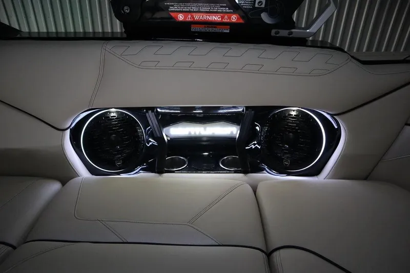 Slide: The Image of 2024 Centurion Ri230 interior with illuminated speakers and cup holders. - 12